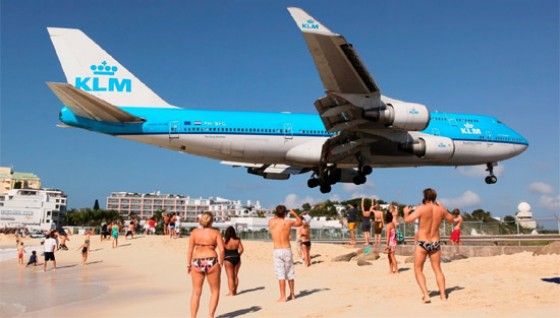 plane lands on vacation beach