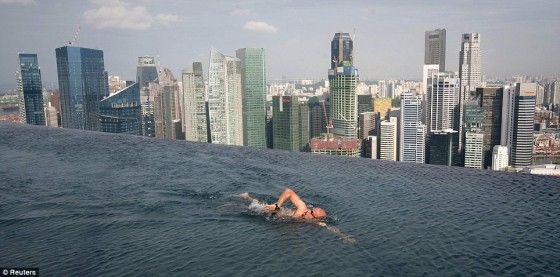 A Creepy Bald Man Swimming In The Marina Bay Sands Infinity Pool