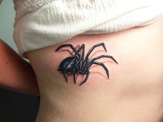 Nasty big spider tattoo on a persons back