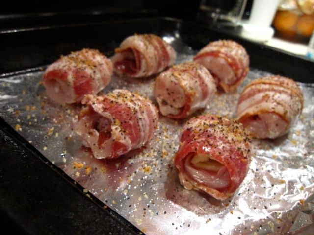 Pieces Of Chicken Wrapped In Bacon On Foil
