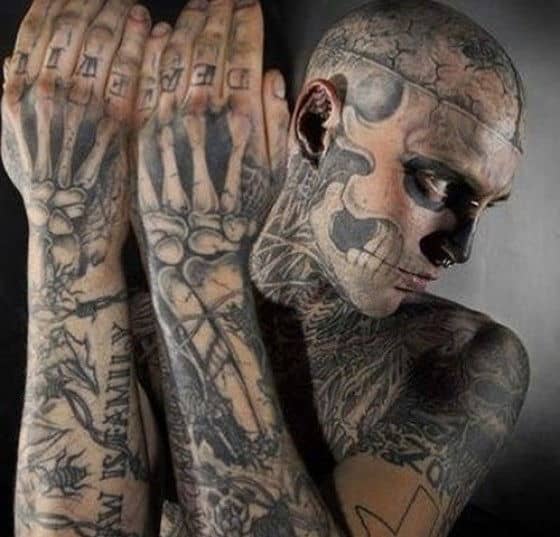 man tattooed to look like zombie