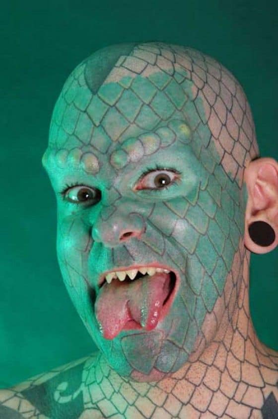 Eric Spraque is the lizard man with split tongue modification