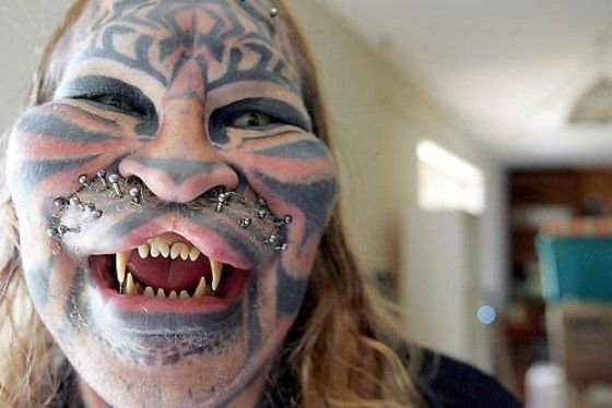 Man modified face to look like tiger