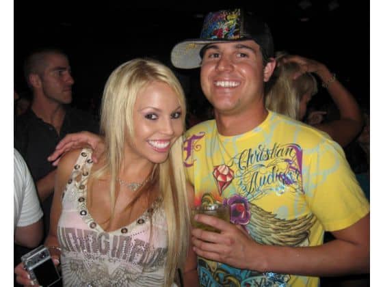 guy and girl wearing tacky brand names