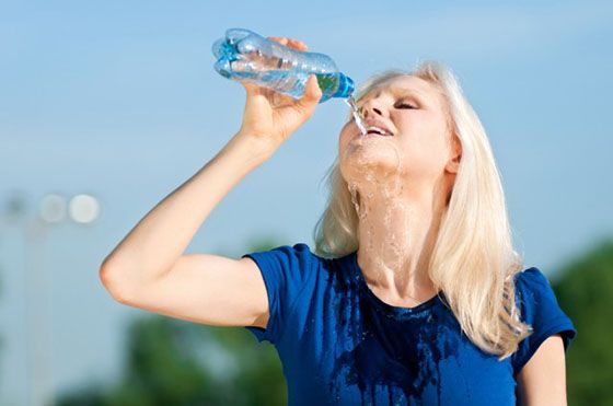 unhappy lady drinking water