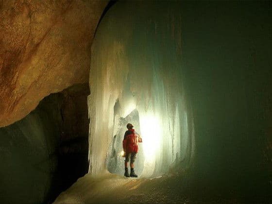 man in ice cave
