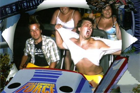 Guy Ripping Shirt Off On Roller Coaster