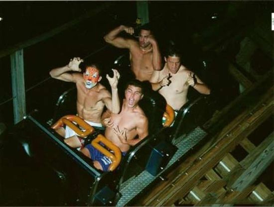 Topless guys on roller coaster