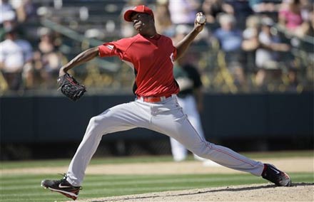 Aroldis Chapman throwing a pitch