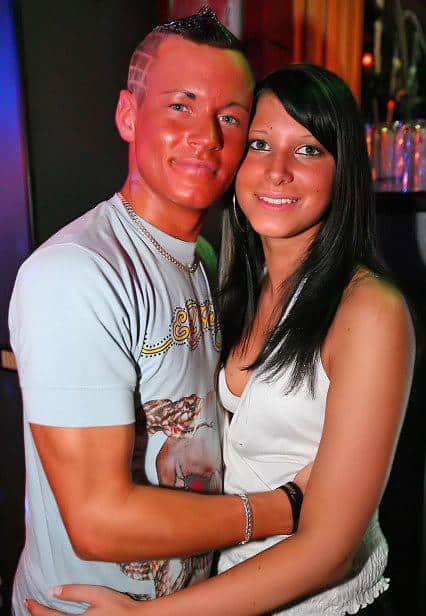 Guy and girl with a fake salon tan