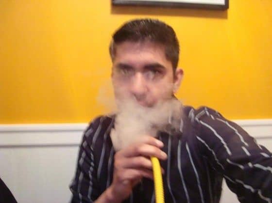 Smoking-Hookah Slowly exhaling Hookah smoke