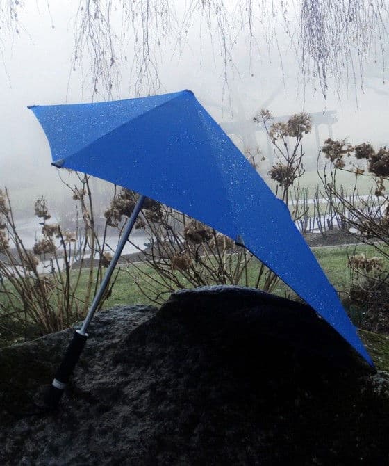 Senz XL Storm Umbrella Sitting On A Rock
