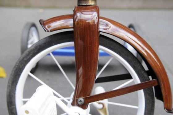 Close up details of a wood grain paint job on bikes