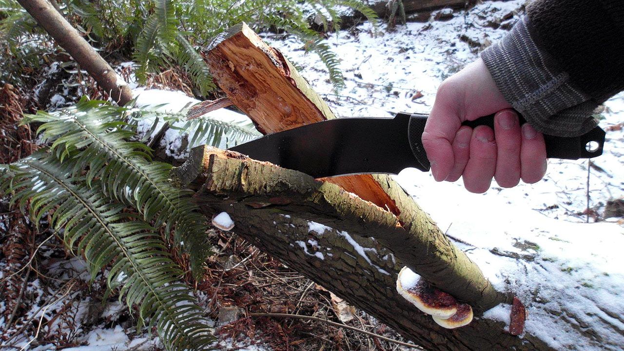 grayman defender chopping wood