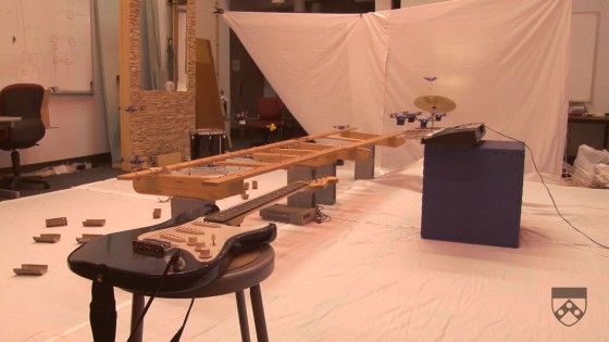 quadrotors playing guitar