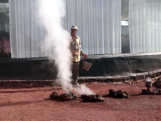steam bath man near volcanic steam