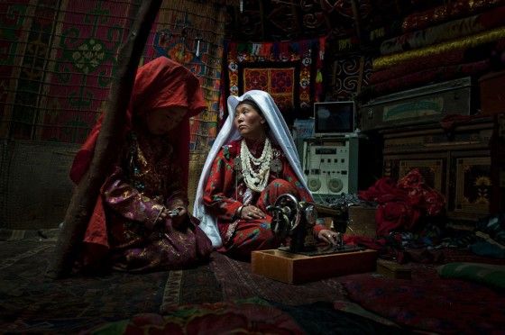 Nomadic Afghan family inside home