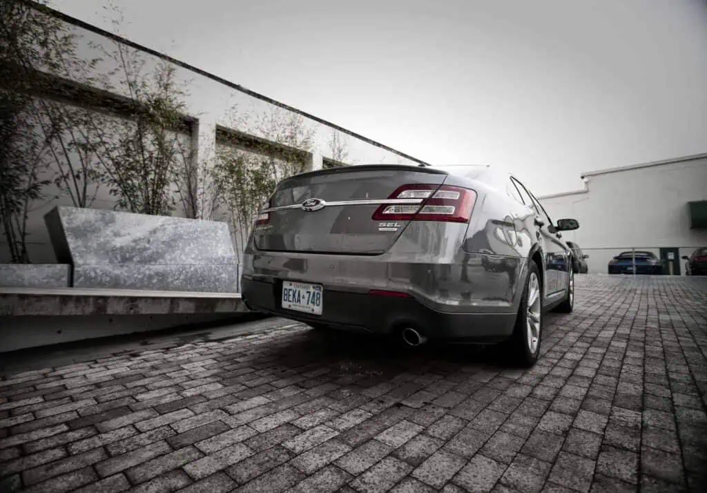 2013 Ford Taurus by brick parking lot