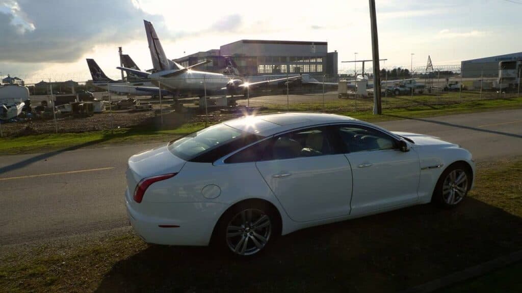 White Jaguar XJL at Airport