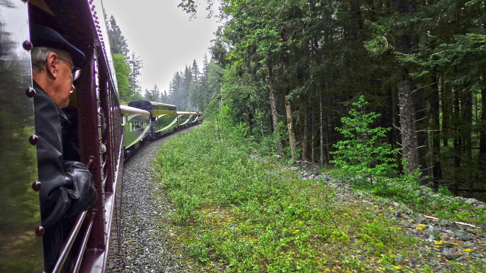 Slow Your Roll - Try Train Travel and Learn To Unwind 2 train travel whistler sea to sky man in train car