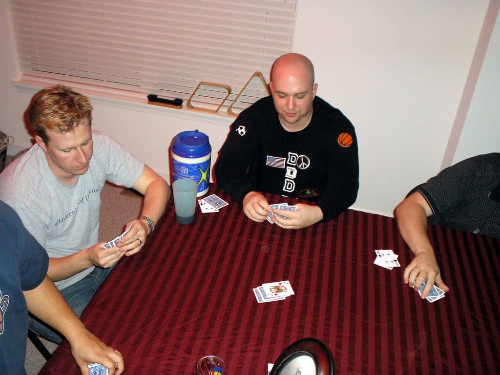 men playing poker
