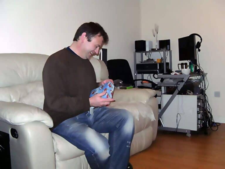 man opening gift