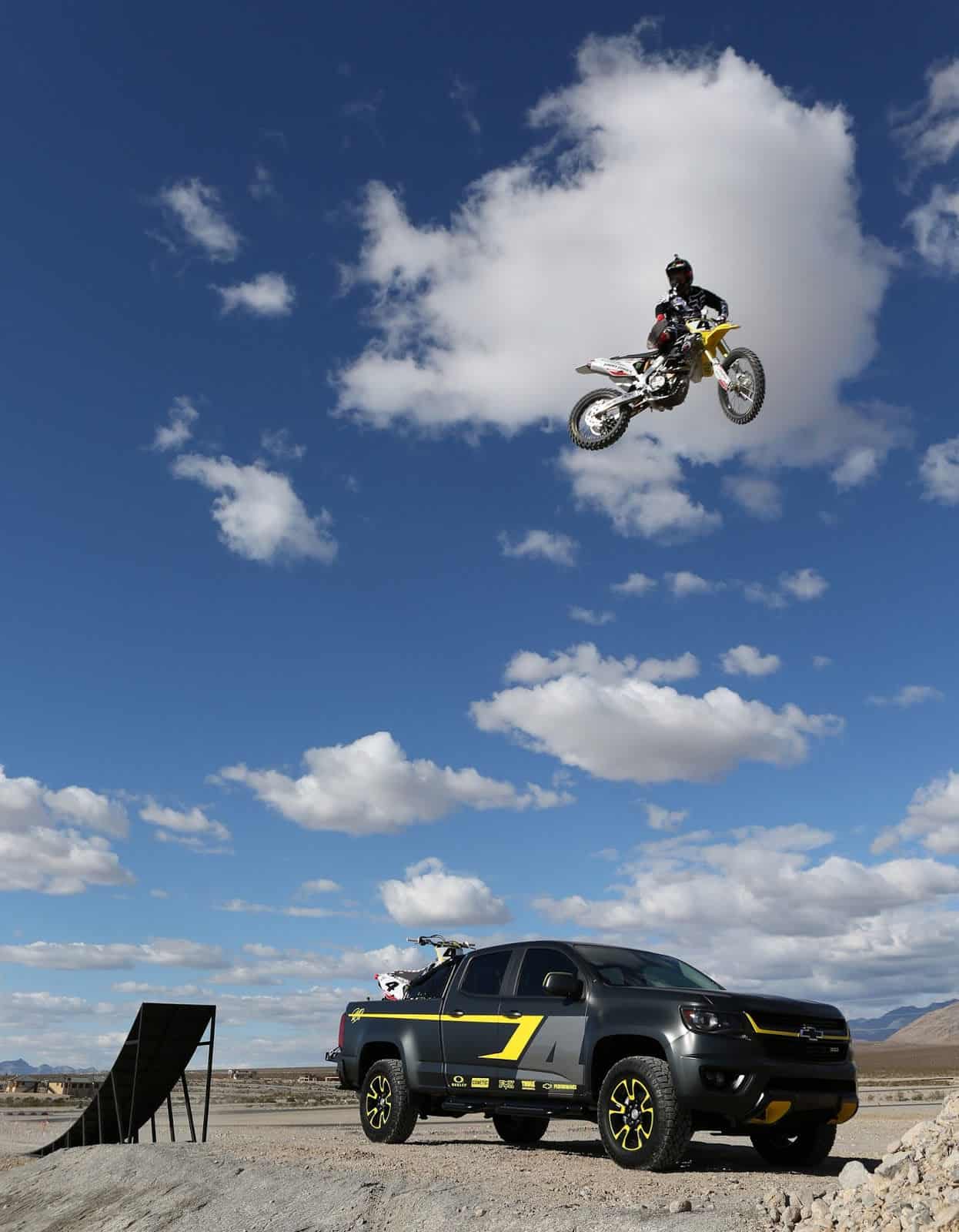 motocross bike jumping over chevy colorado 
