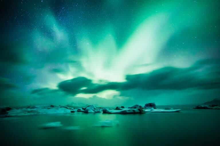 northern lights over water