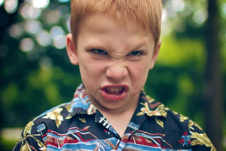 child pretend angry face