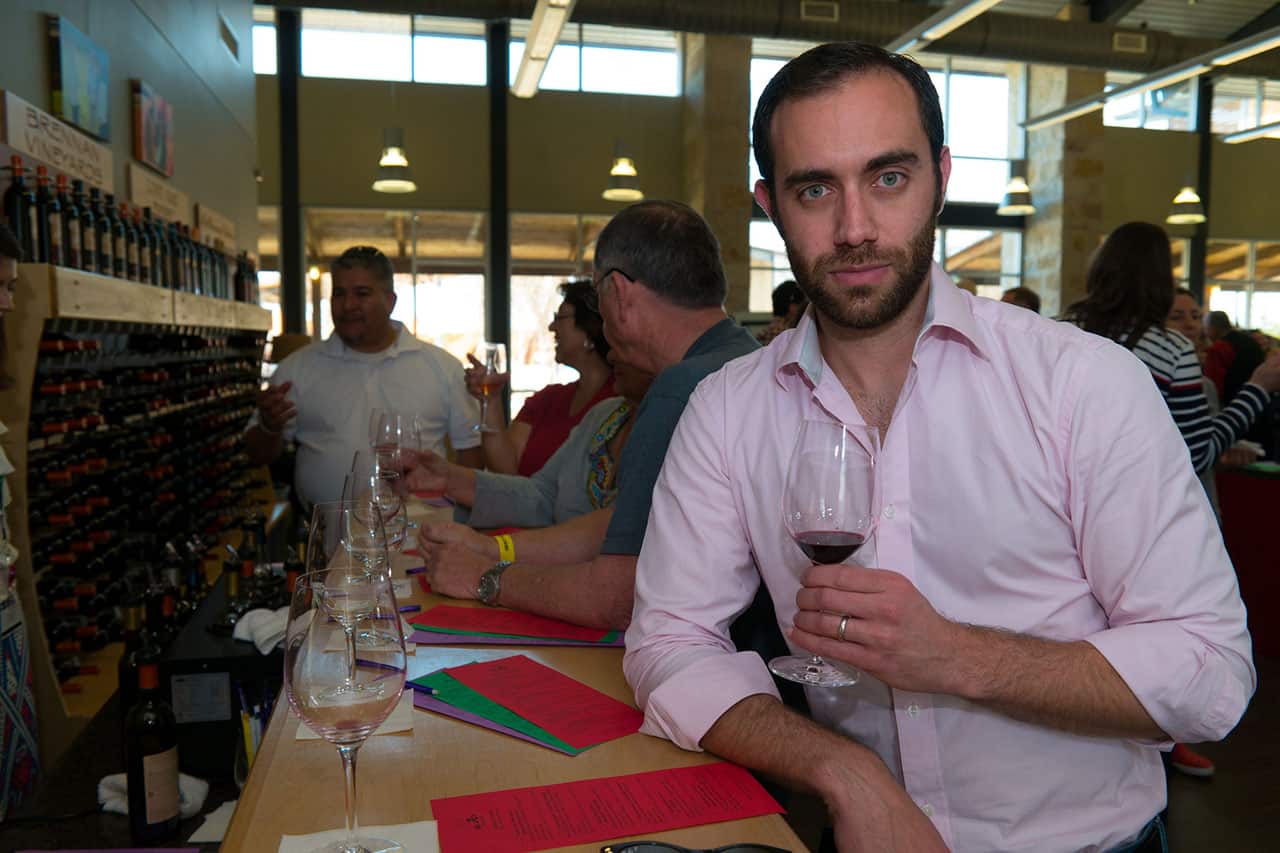 man drinking wine