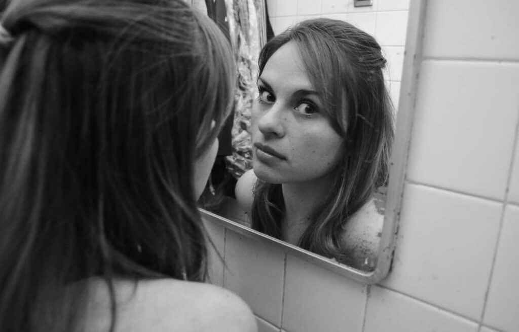 woman skin in mirror