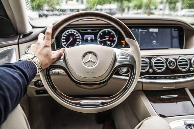 rich man driving car