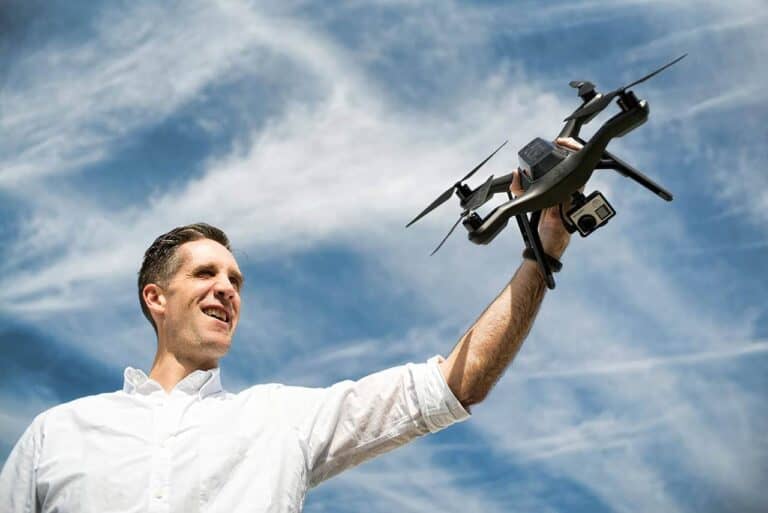 man holding drone