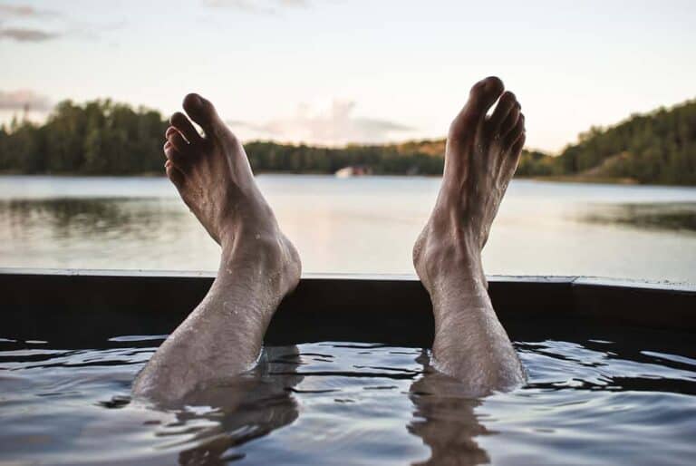 man with feet in air
