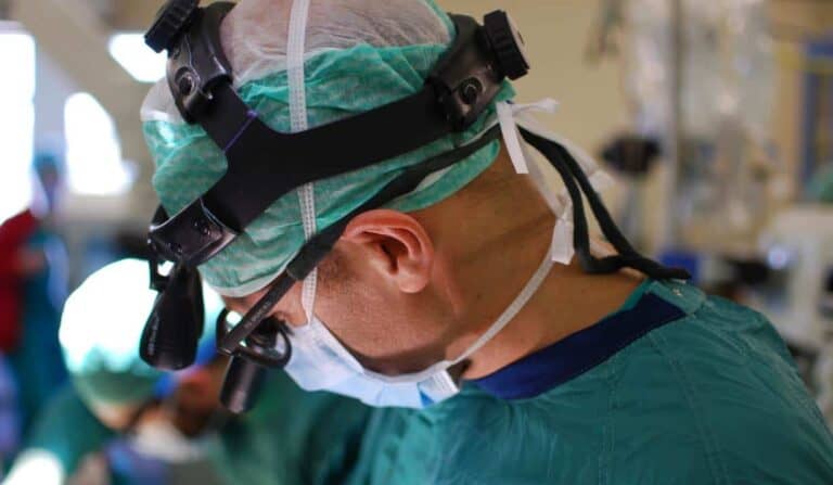 cardiac surgeon working hard