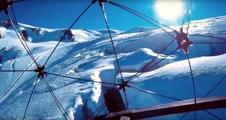 drone flying over glacier