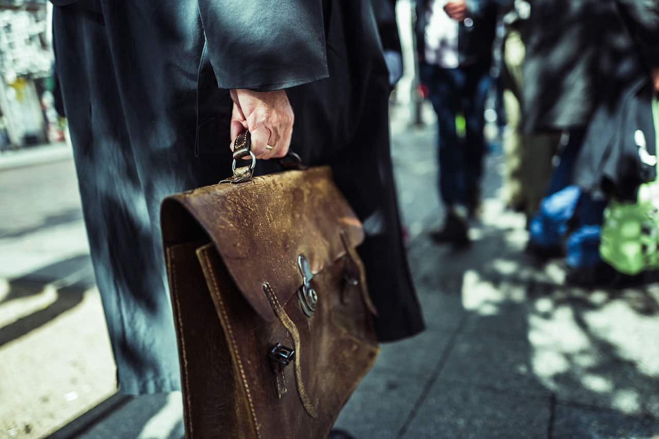 man holding business briefcase
