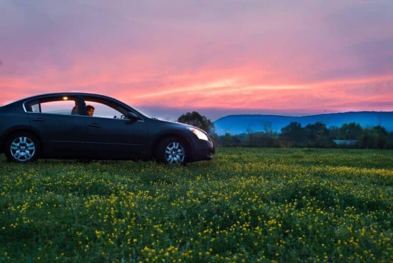 beautiful sunset with car