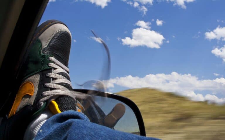 foot out car window