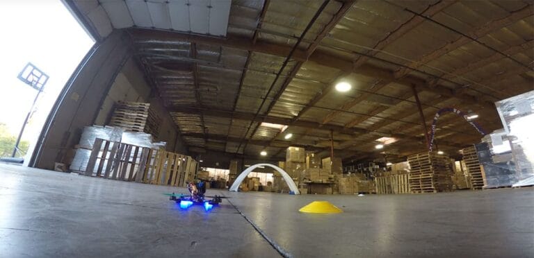 drone racing inside warehouse