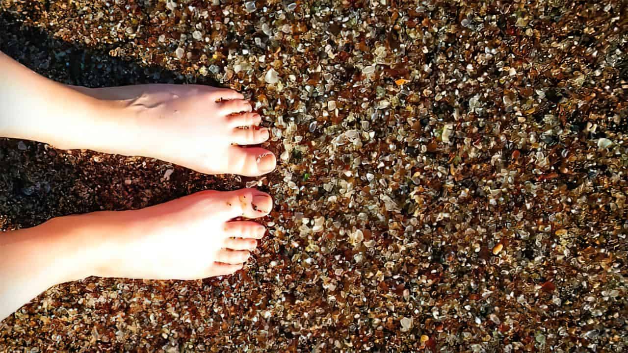 feet on glass beach
