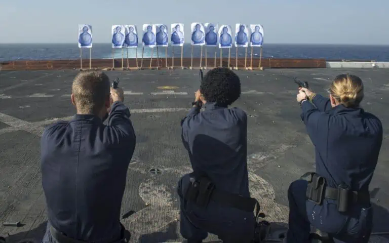 people shooting handguns