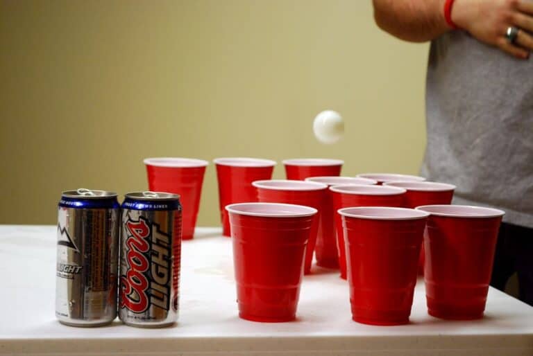 playing beer pong