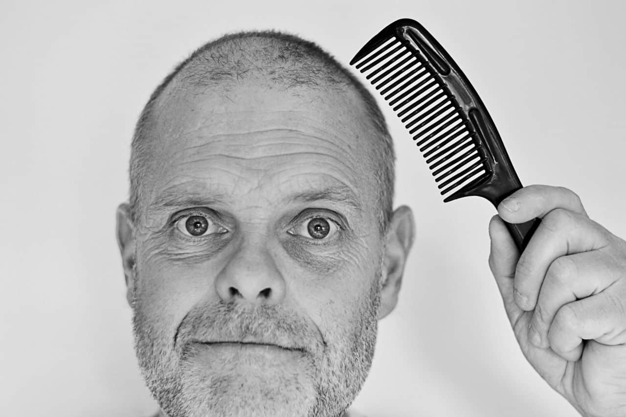 balding man comb
