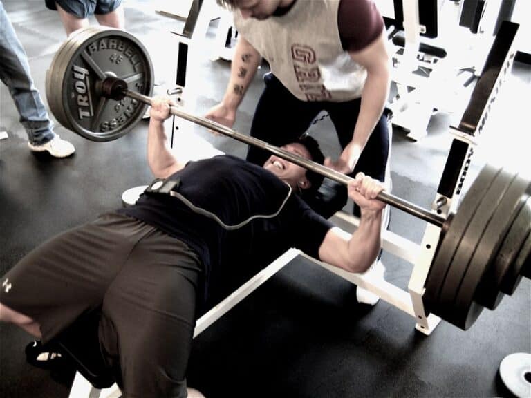 man bench pressing
