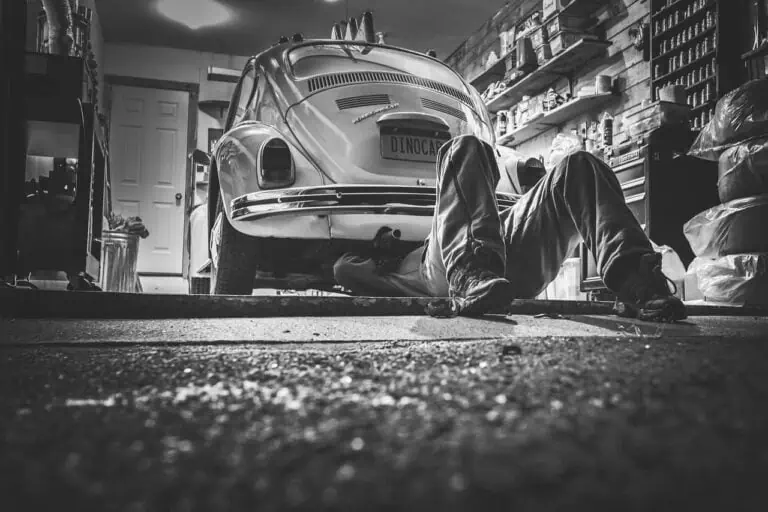 mechanic under car