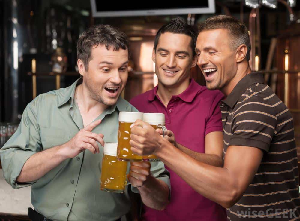 three men drinking beer