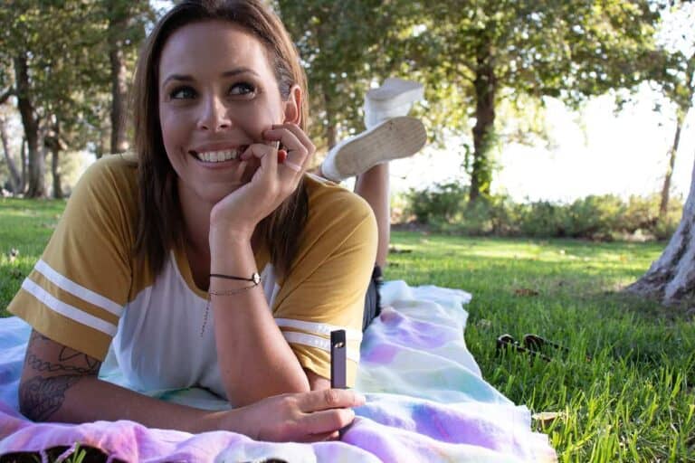 happy woman vaping