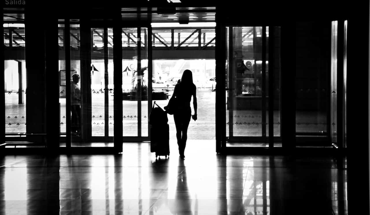 woman leaving airport