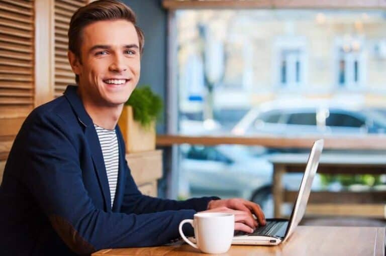 smiling man computer